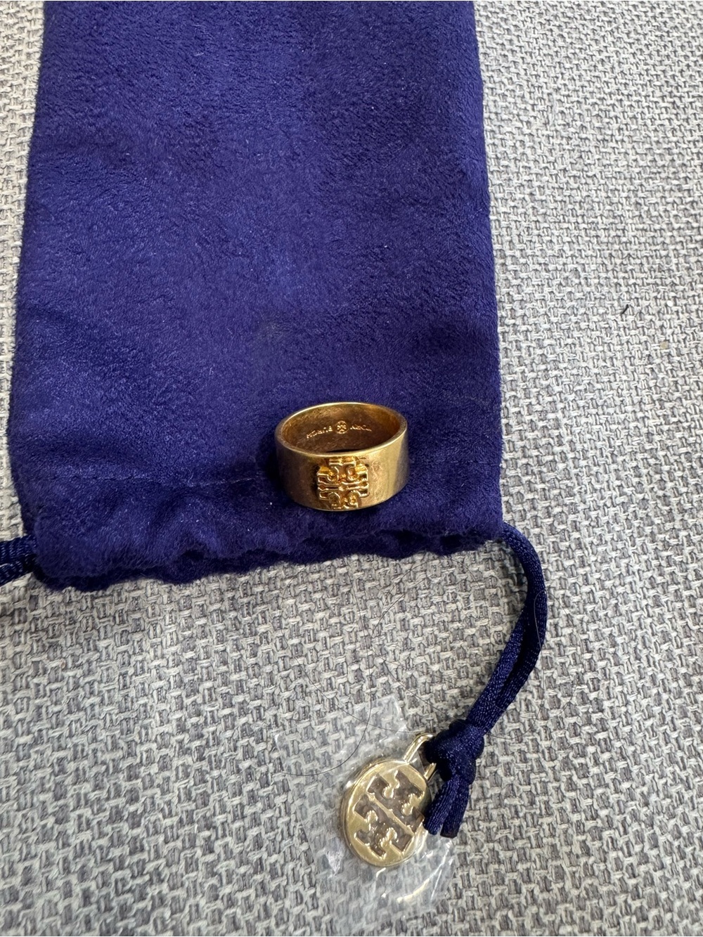 Tory Burch Gold-Tone Logo Band with Navy Pouch